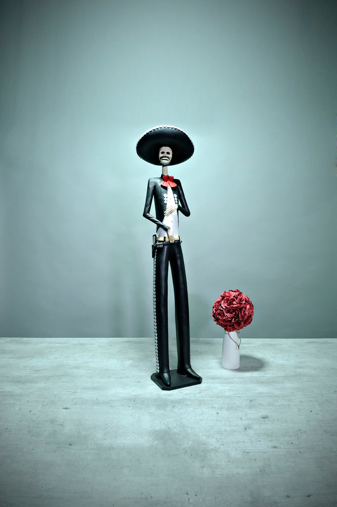 For our Viva Mexico celebration, we present to you our stunning oversized Pancho, whose impressive height will surely make a great impression on your guests.  Pancho is wearing a traditional Charro Suit; the Charro Suit first appeared in the 16th century and has evolved into an elegant suit made with quality hand-made crafts like gold and silver buttons and many intricate embroideries.