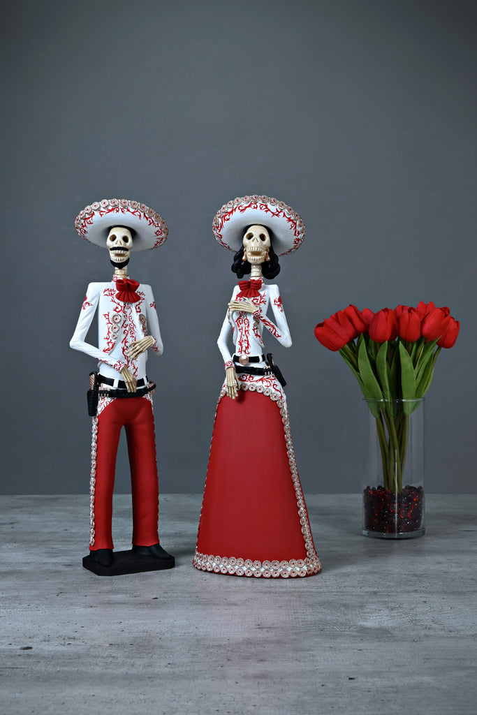 Introducing Catrines Flor and Jorge from our Grand Collection.  They both wear stunning red Charro suits with intricate hand-painted designs in red.   The artisan did an outstanding job creating these pieces that add a stylish touch to any home, accurately representing Mexico and its beauty. 