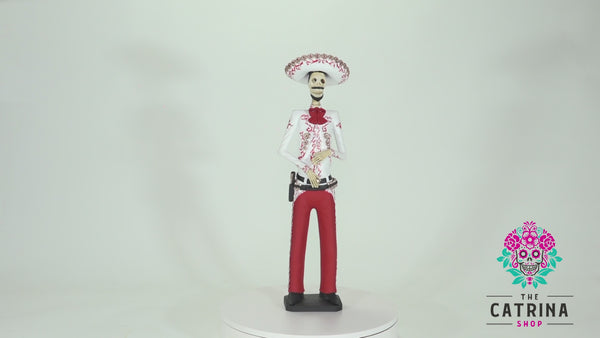 Introducing Catrin Jorge from our Grand Collection.  Jorge is wearing a bright red Charro suit; the Charro Suit first appeared in the 16th century and evolved into an elegant suit made with quality hand-made crafts like the gold buttons and the many intricate hand-painted embroideries in gold.  The artisan did an outstanding job creating this piece that adds a stylish touch to any home and accurately represents Mexico and its beauty.   SAVE 10% WHEN YOU BUY THE COUPLE.